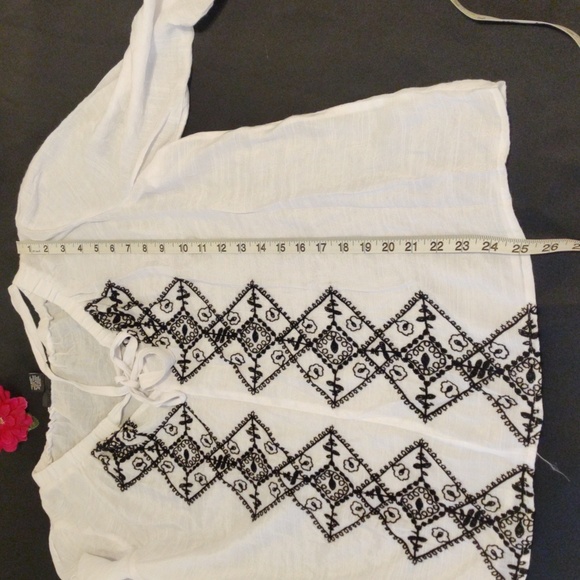 NYCC Semi-transparent white blouse with black embroidery on the front. - Picture 9 of 10